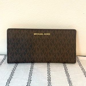Michael Kors snap wallet with card holder included